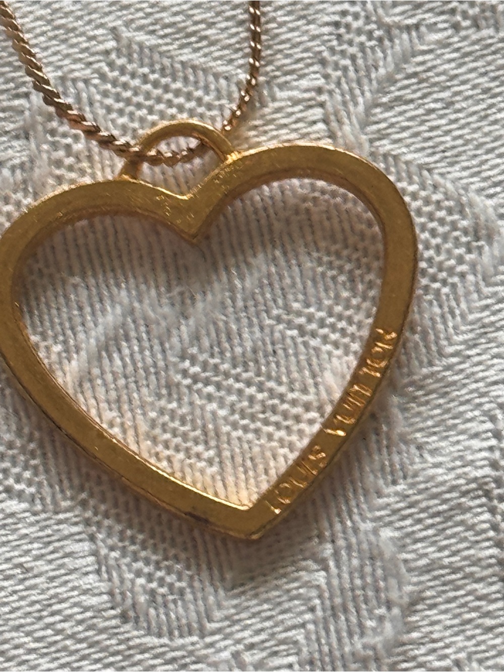 Louis Vuitton Open Heart Pendant Necklace in Gold Tone